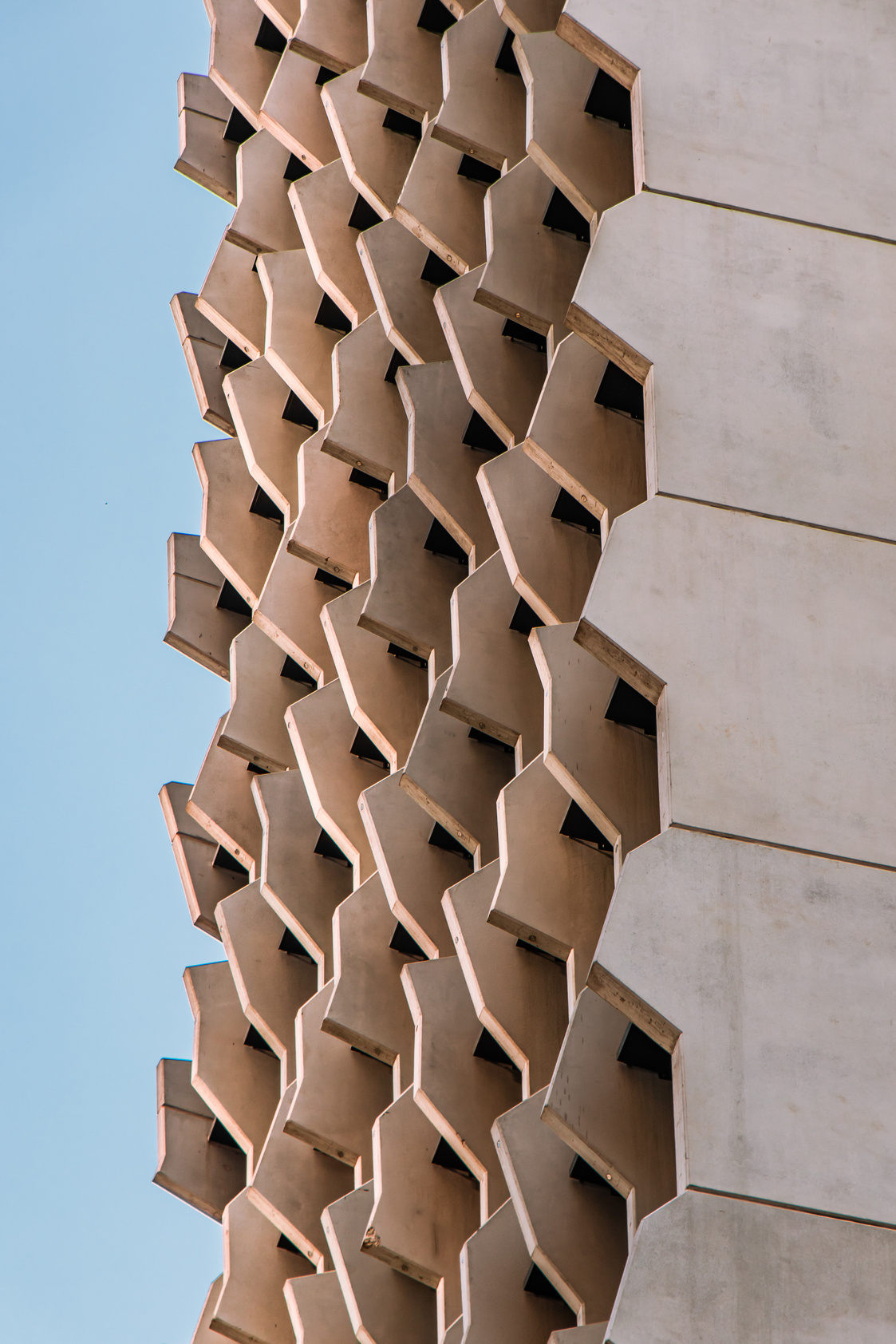 White Concrete Building Under Blue Sky